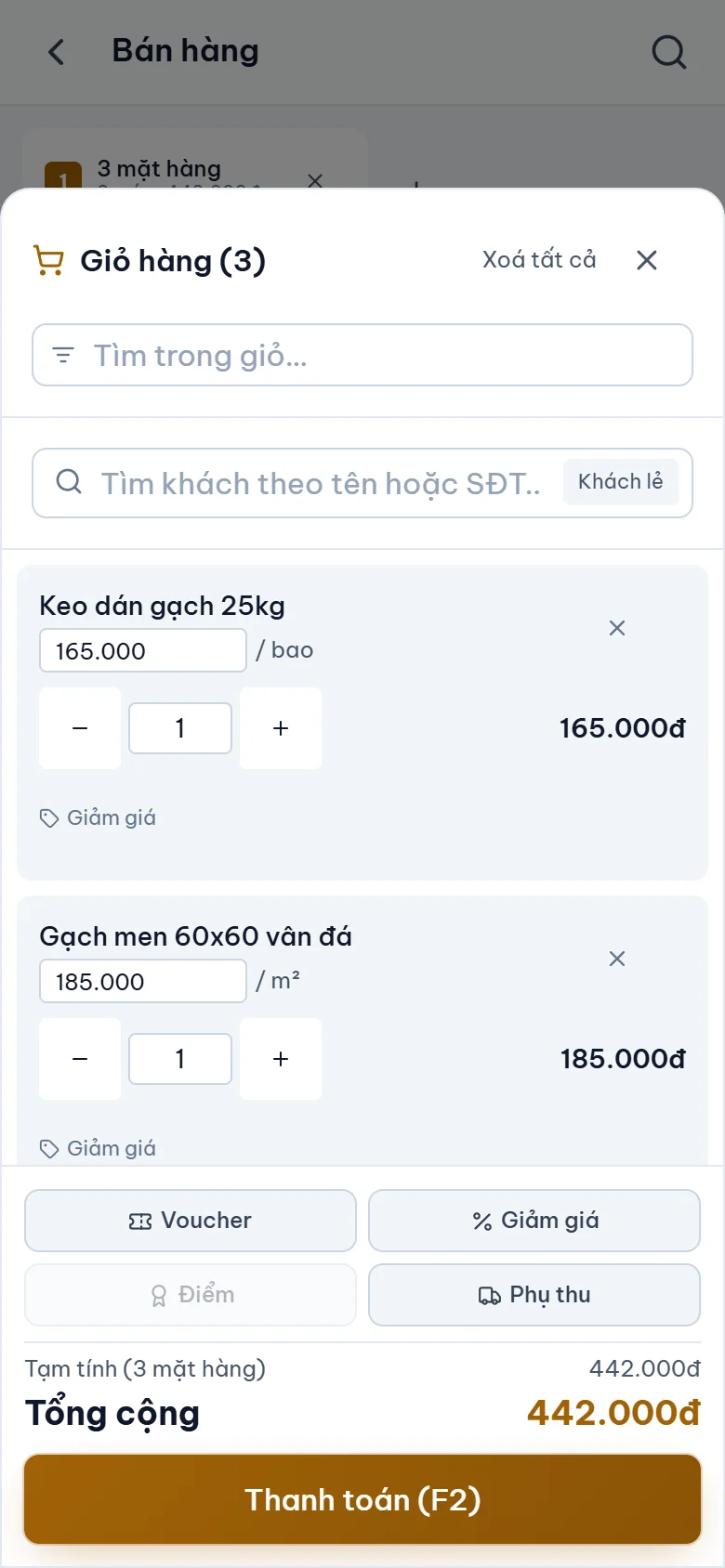 Giỏ hàng trong app của cửa hàng Hùng Phát: xi măng, keo dán gạch, gạch men, tổng cộng và nút Thanh toán